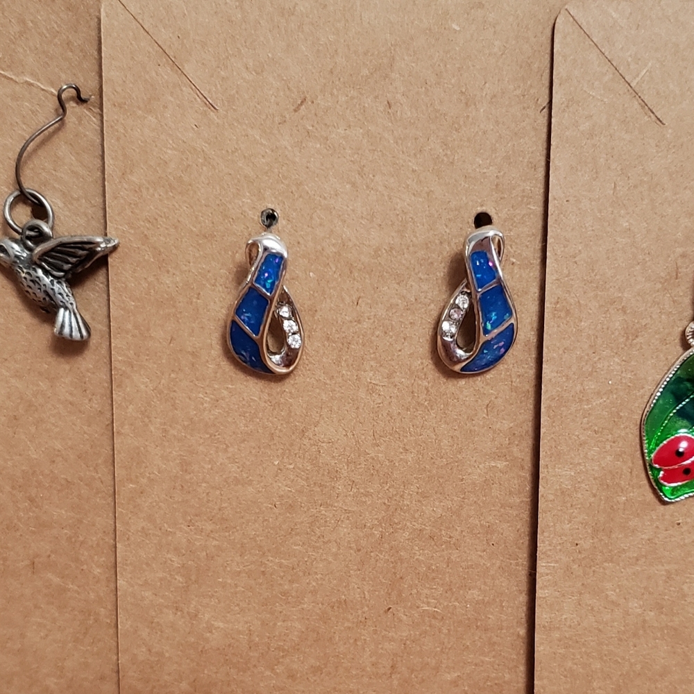 Bundle of 3 pairs of earrings. Very pretty. Green leaves marked Jj jonette Avon